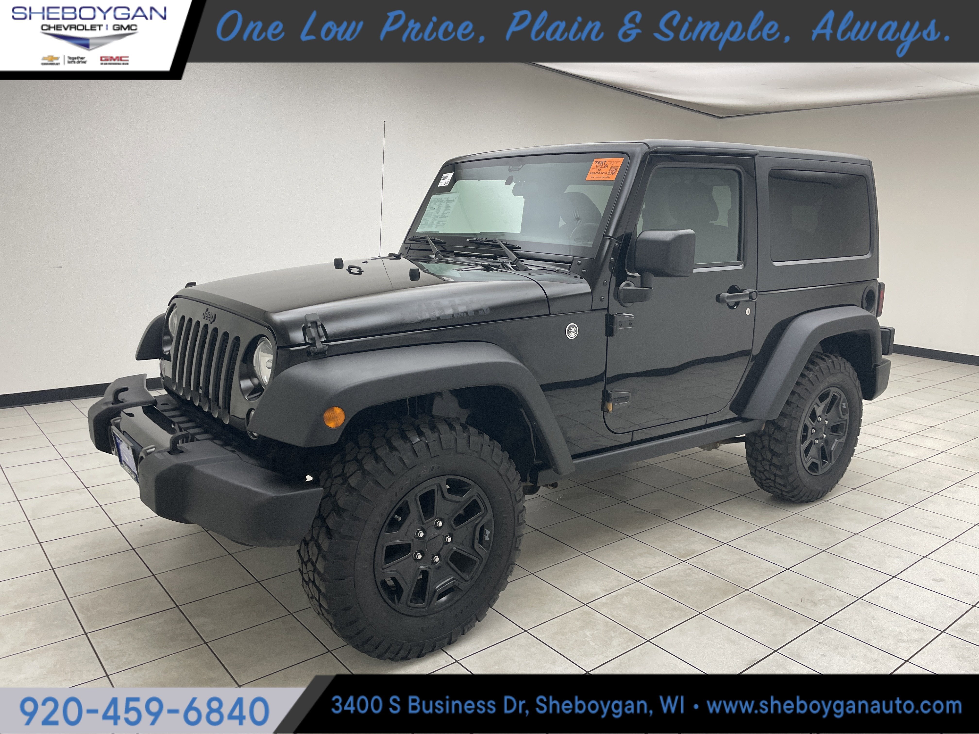 2017 Jeep Wrangler Willy Wheeler 4x4 in Black — front three-quarter view