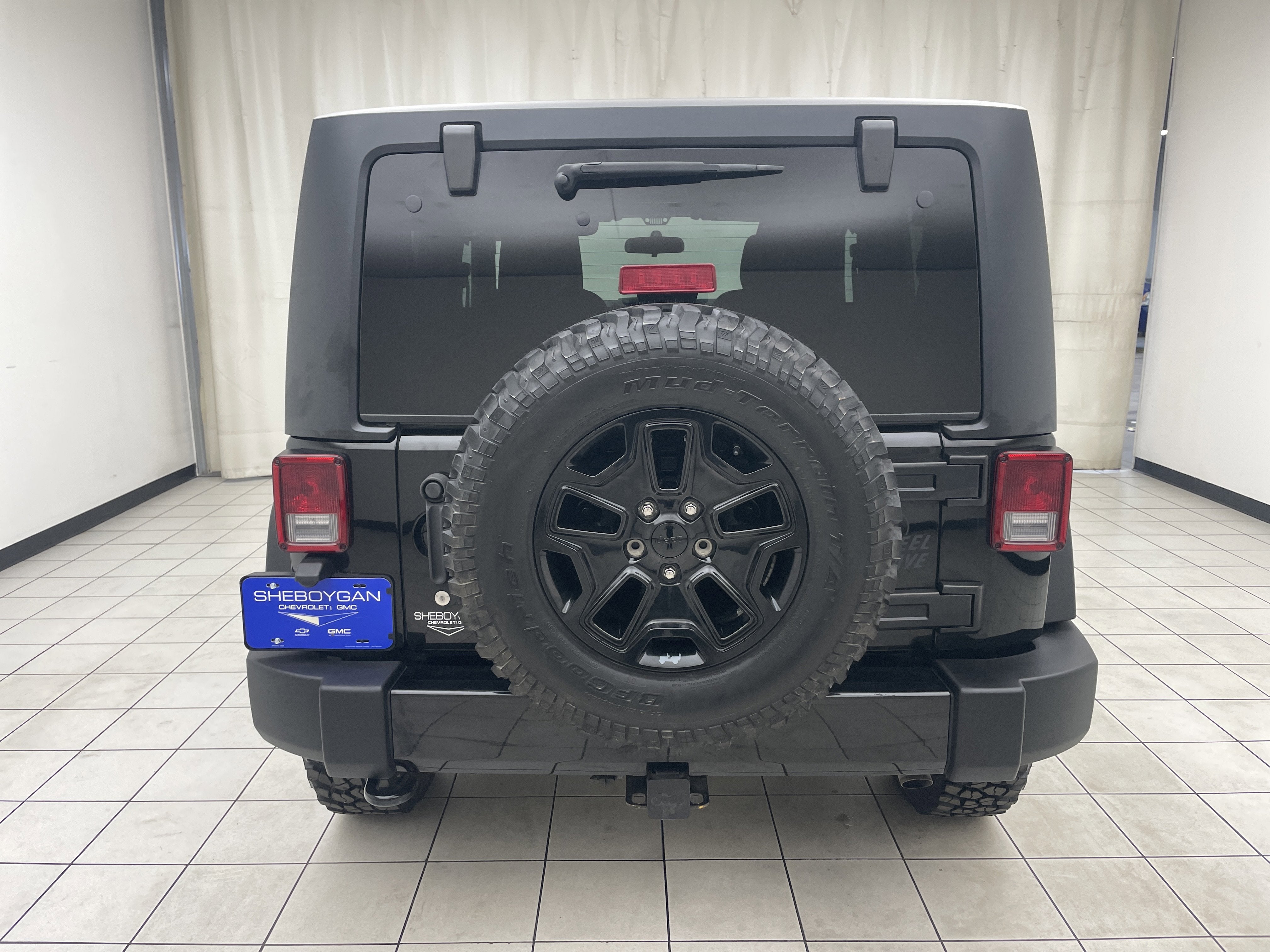 2017 Jeep Wrangler — rear three-quarter view
