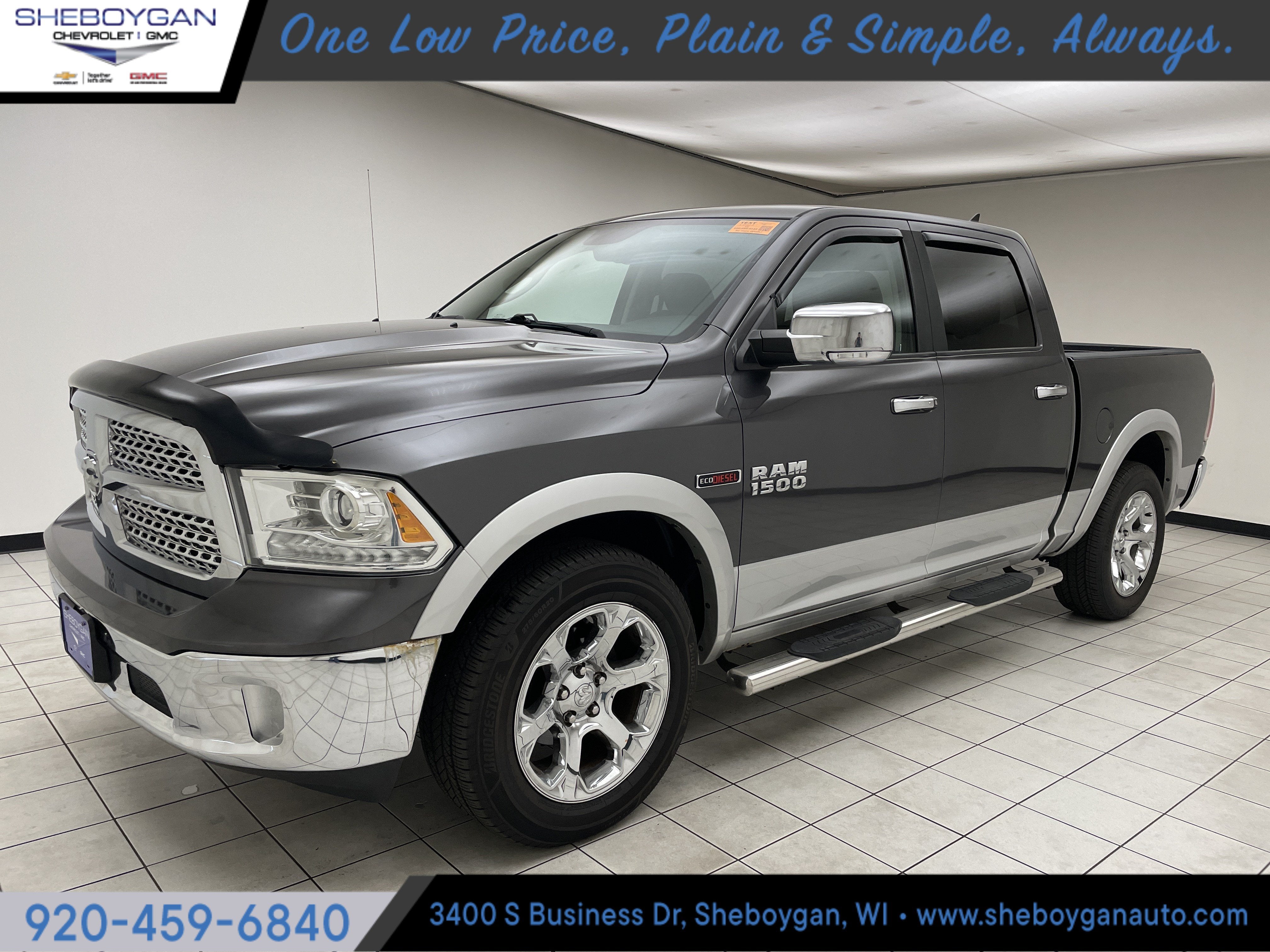 2016 RAM 1500 Laramie in Gray — front three-quarter view
