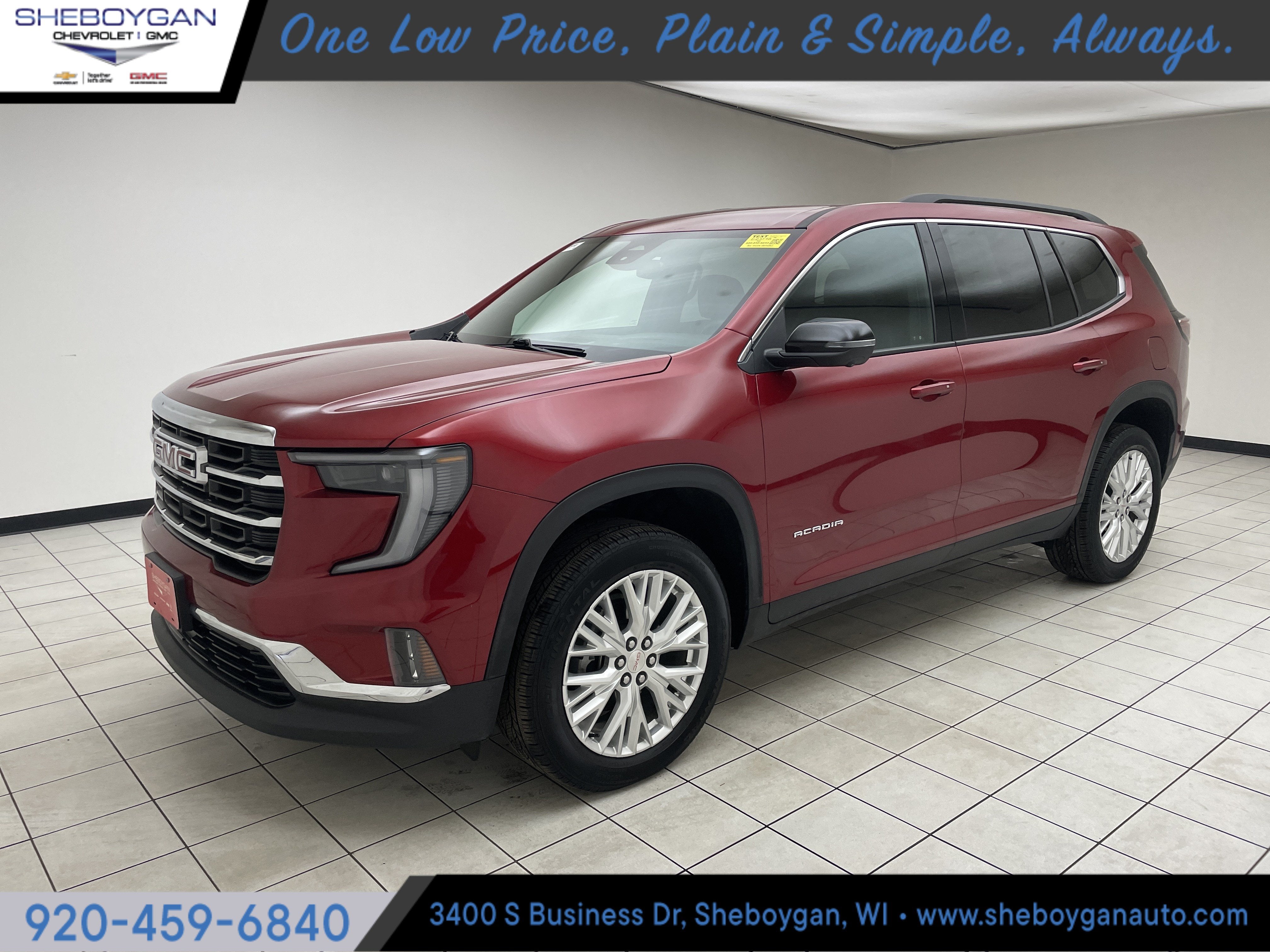 2024 GMC Acadia Elevation in Volcanic Red Tintcoat — front three-quarter view