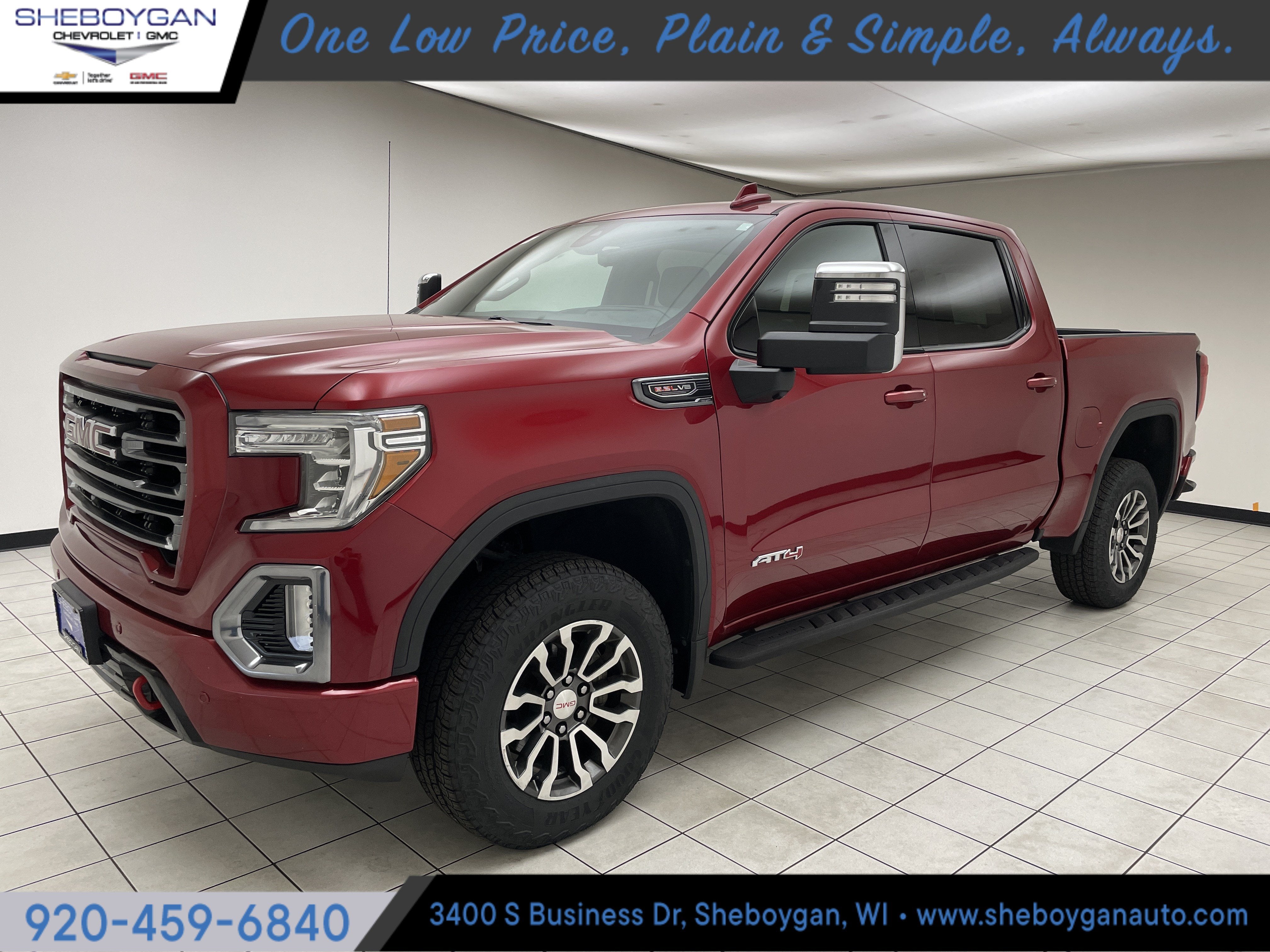 2021 GMC Sierra 1500 AT4 in Cayenne Red Tintcoat — front three-quarter view