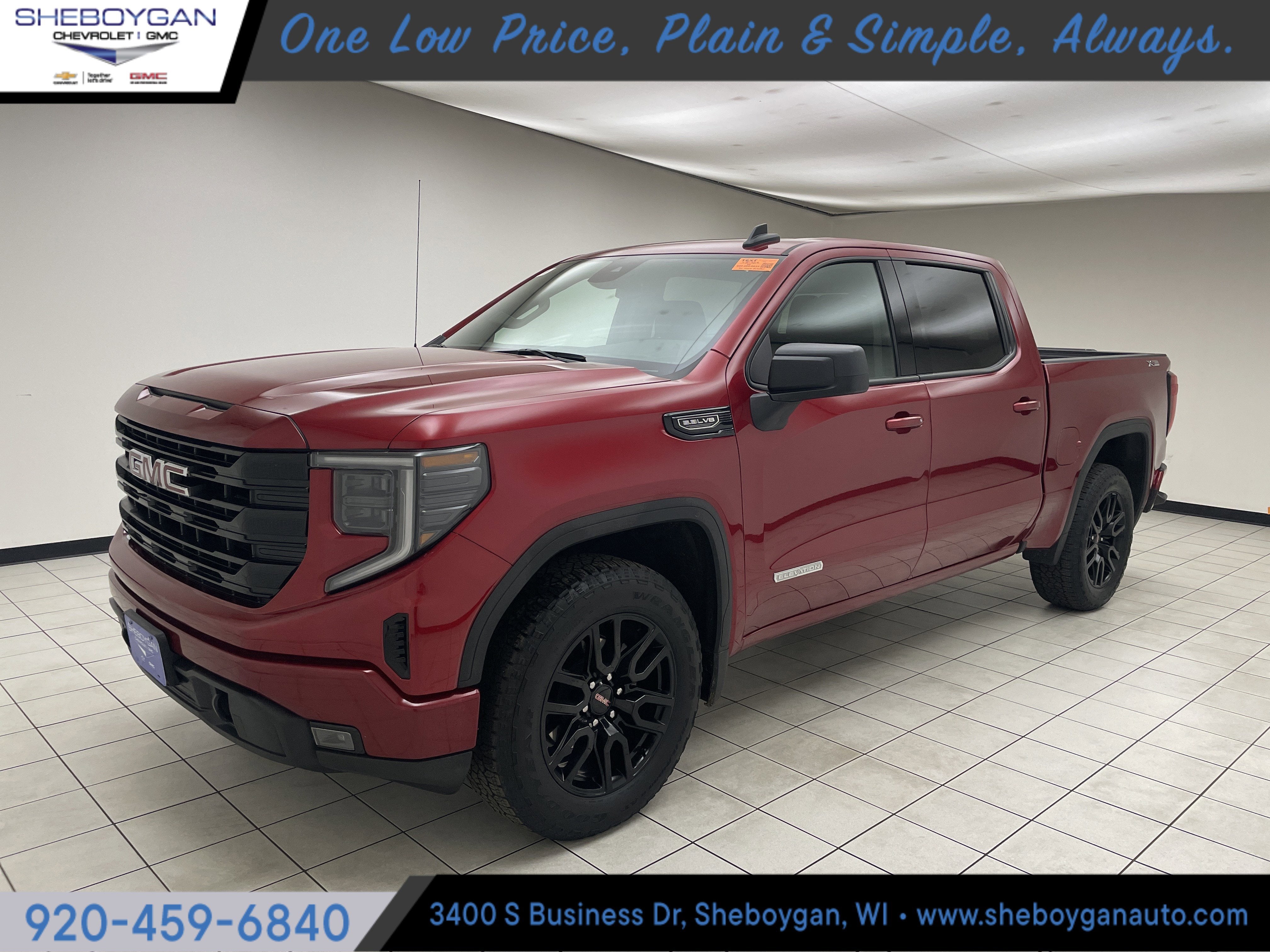 2023 GMC Sierra 1500 Elevation in Volcanic Red Tintcoat — front three-quarter view