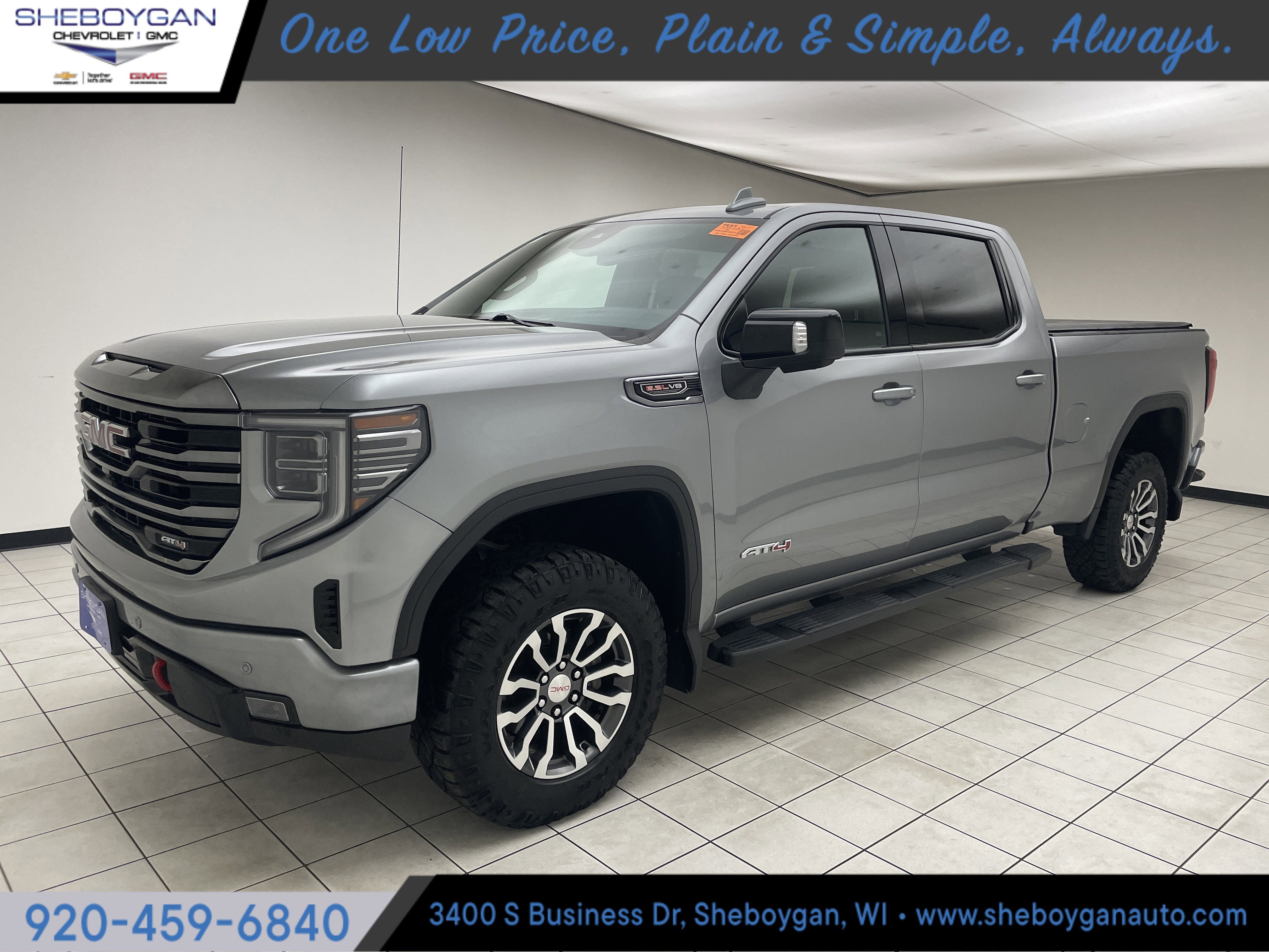 2023 GMC Sierra 1500 AT4 in Sterling Metallic — front three-quarter view