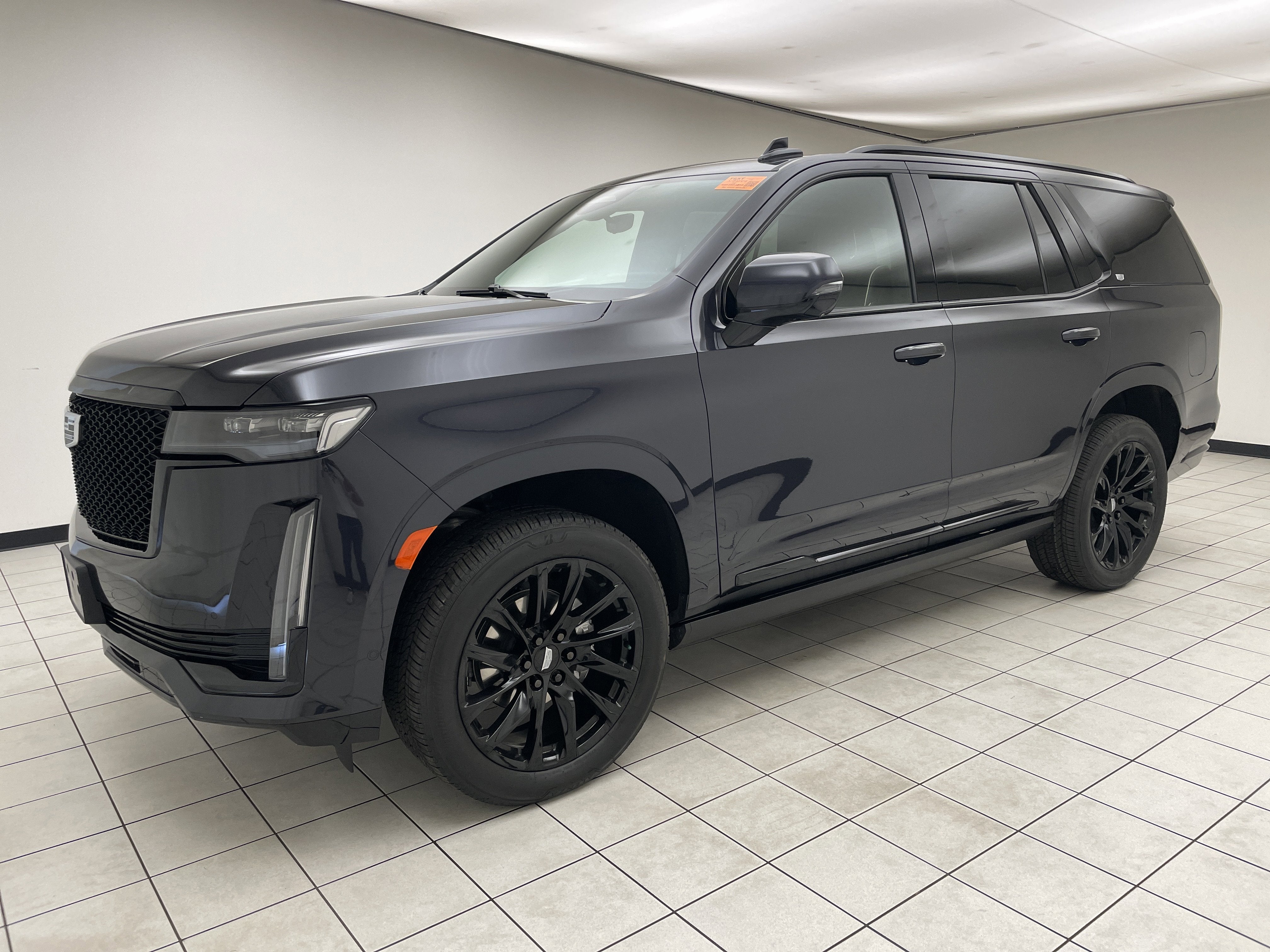 2024 Cadillac Escalade Sport in Galactic Gray Metallic — front three-quarter view