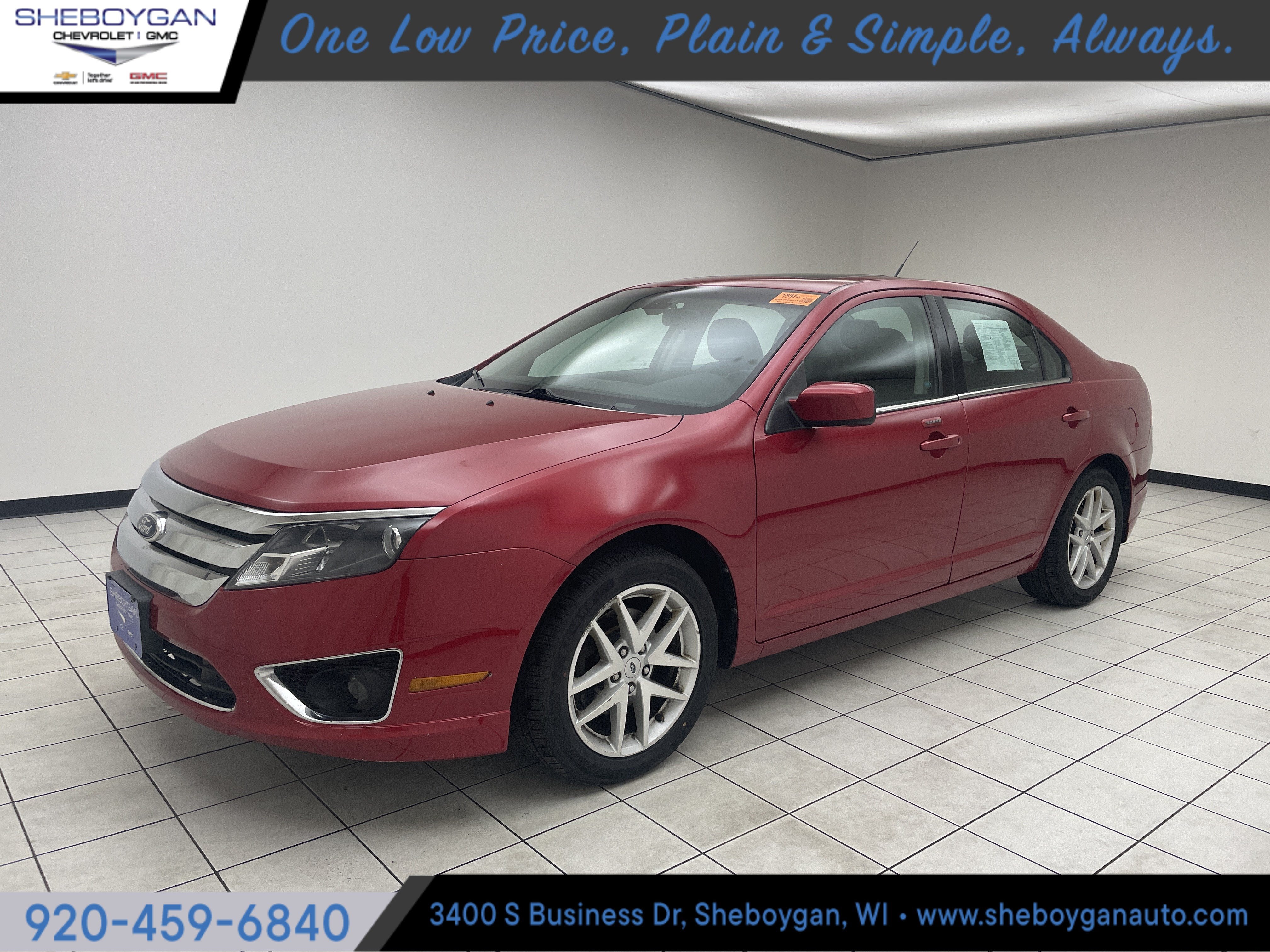 2012 Ford Fusion SEL in Red — front three-quarter view