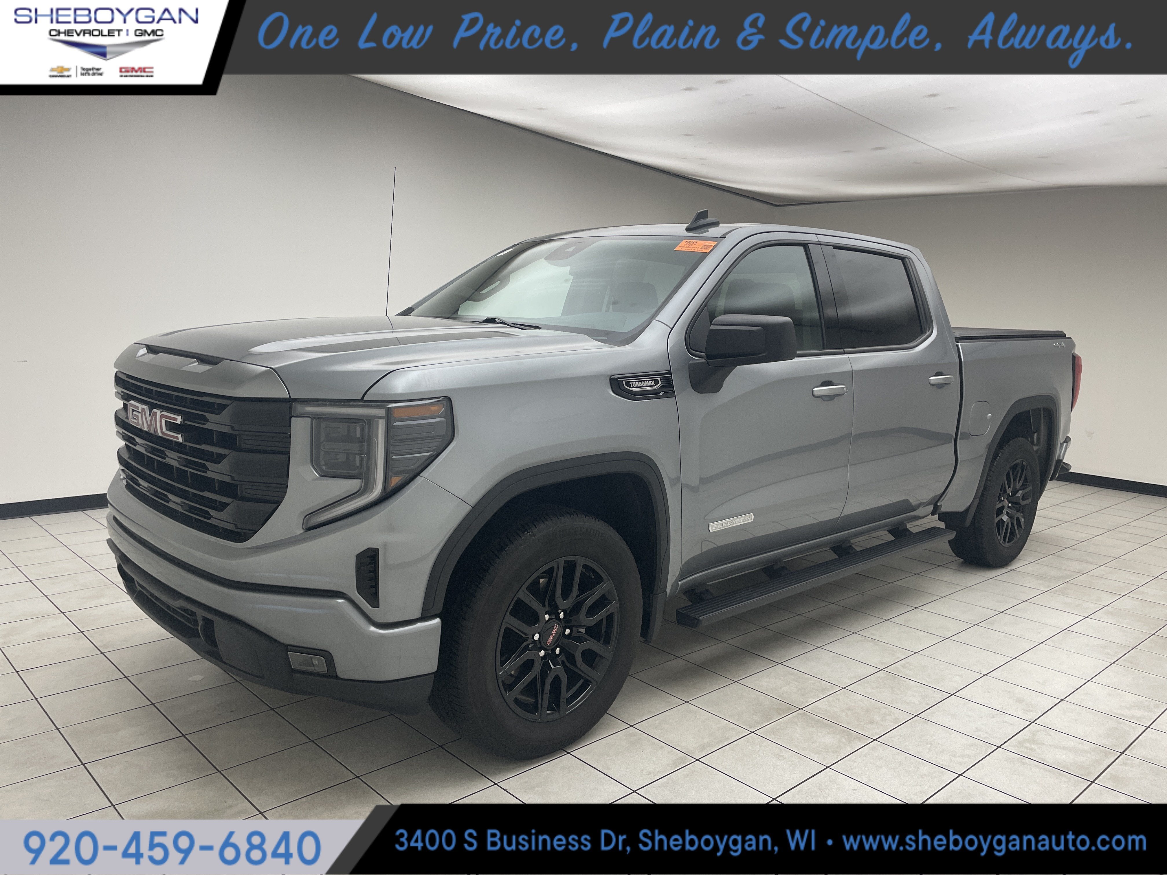 2024 GMC Sierra 1500 Elevation in Sterling Metallic — front three-quarter view