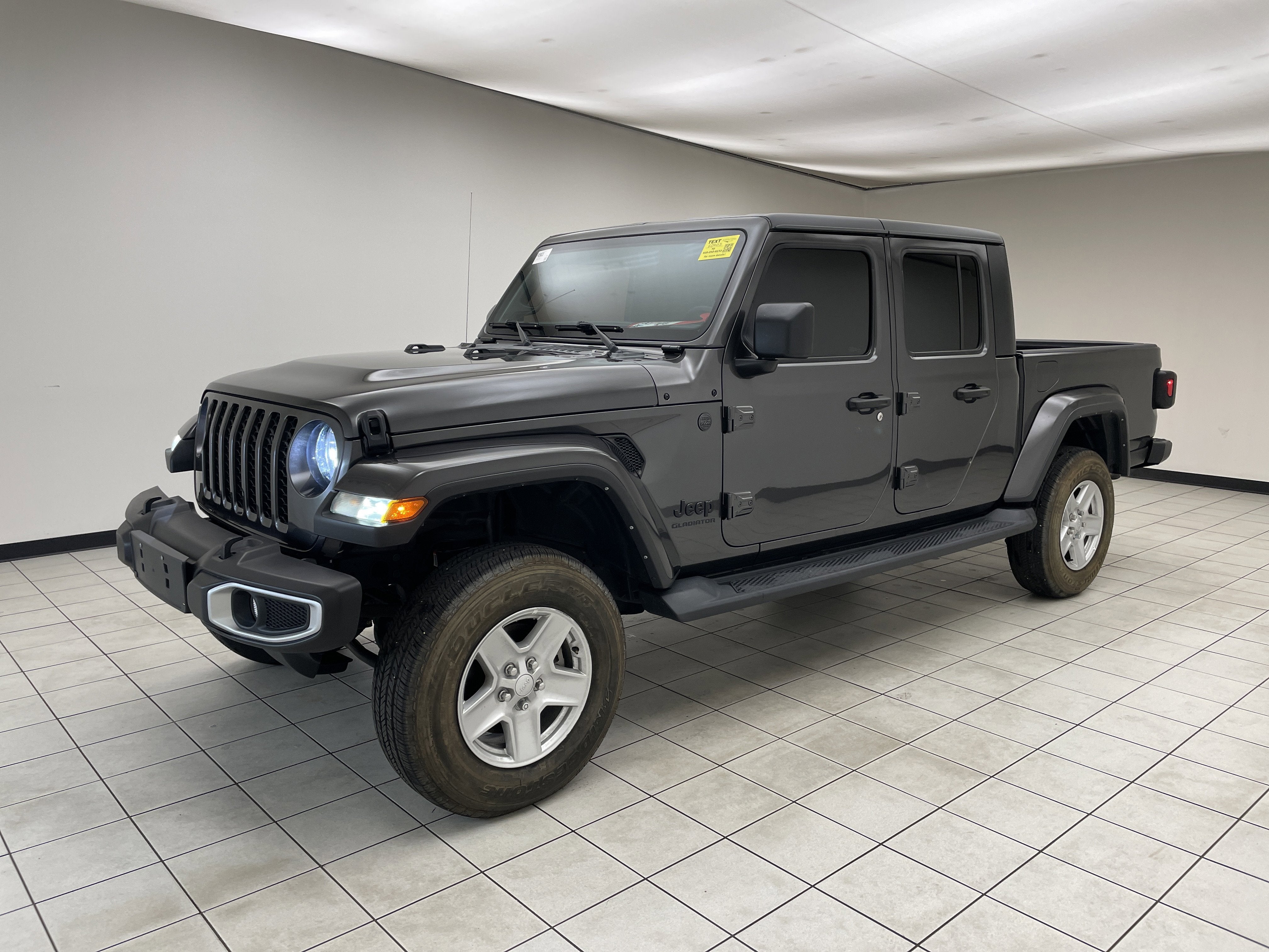 2022 Jeep Gladiator Sport S 4x4 in Granite Crystal Metallic Clearcoat — front three-quarter view