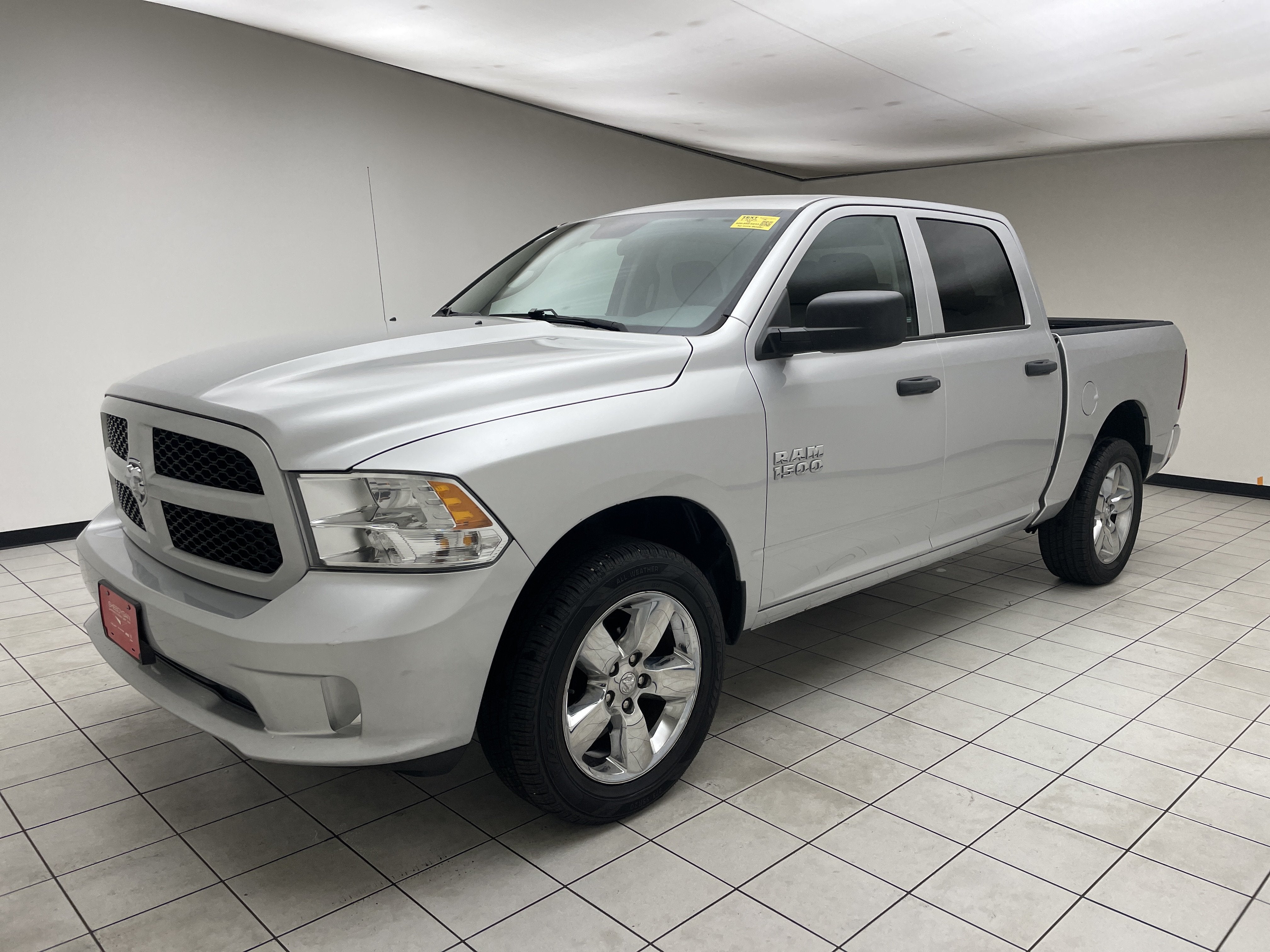 2017 RAM 1500 Express in Bright Silver Metallic Clearcoat — front three-quarter view