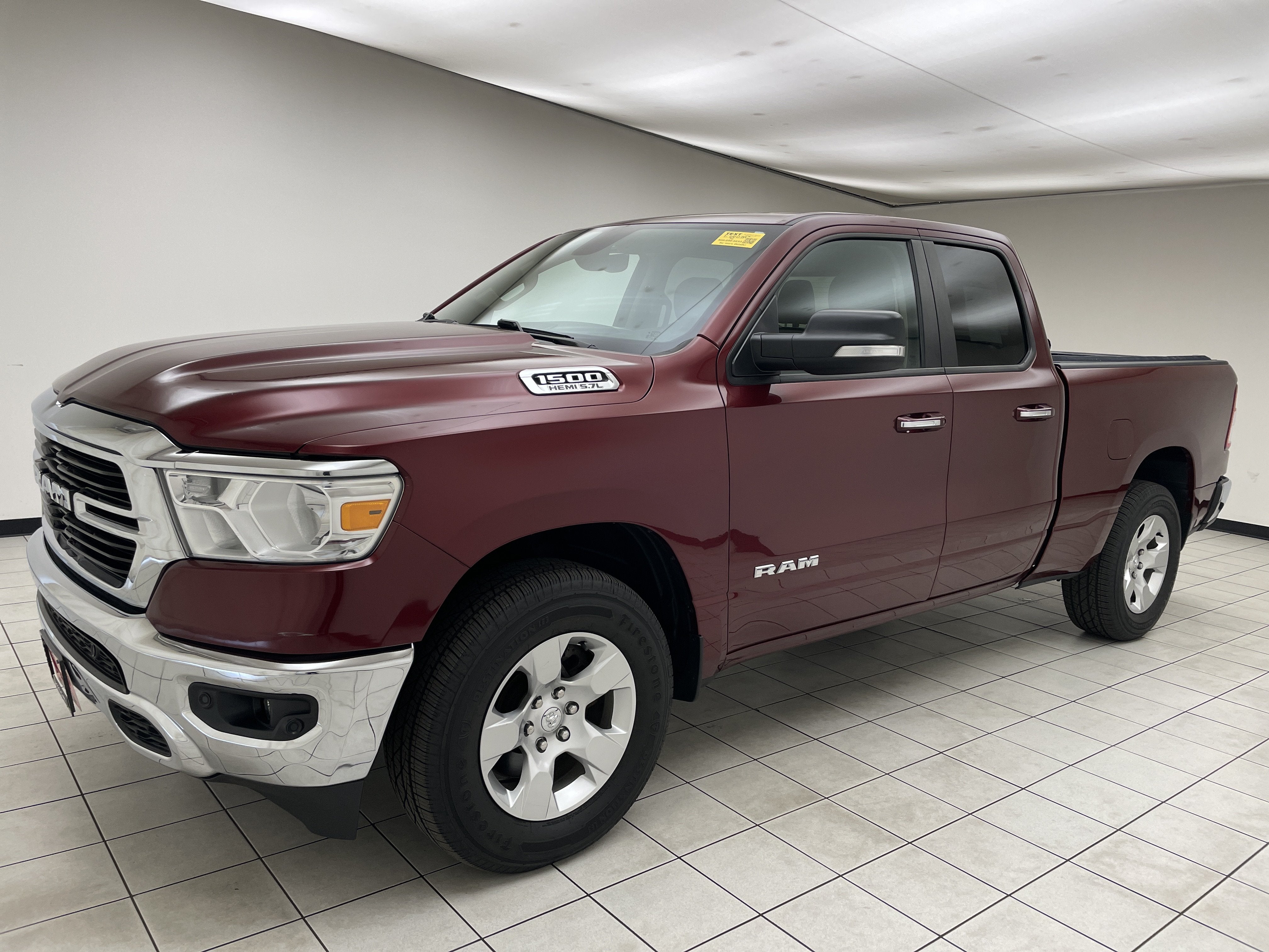2020 RAM 1500 Big Horn Quad Cab 4x4 6'4' Box in Delmonico Red Pearlcoat — front three-quarter view