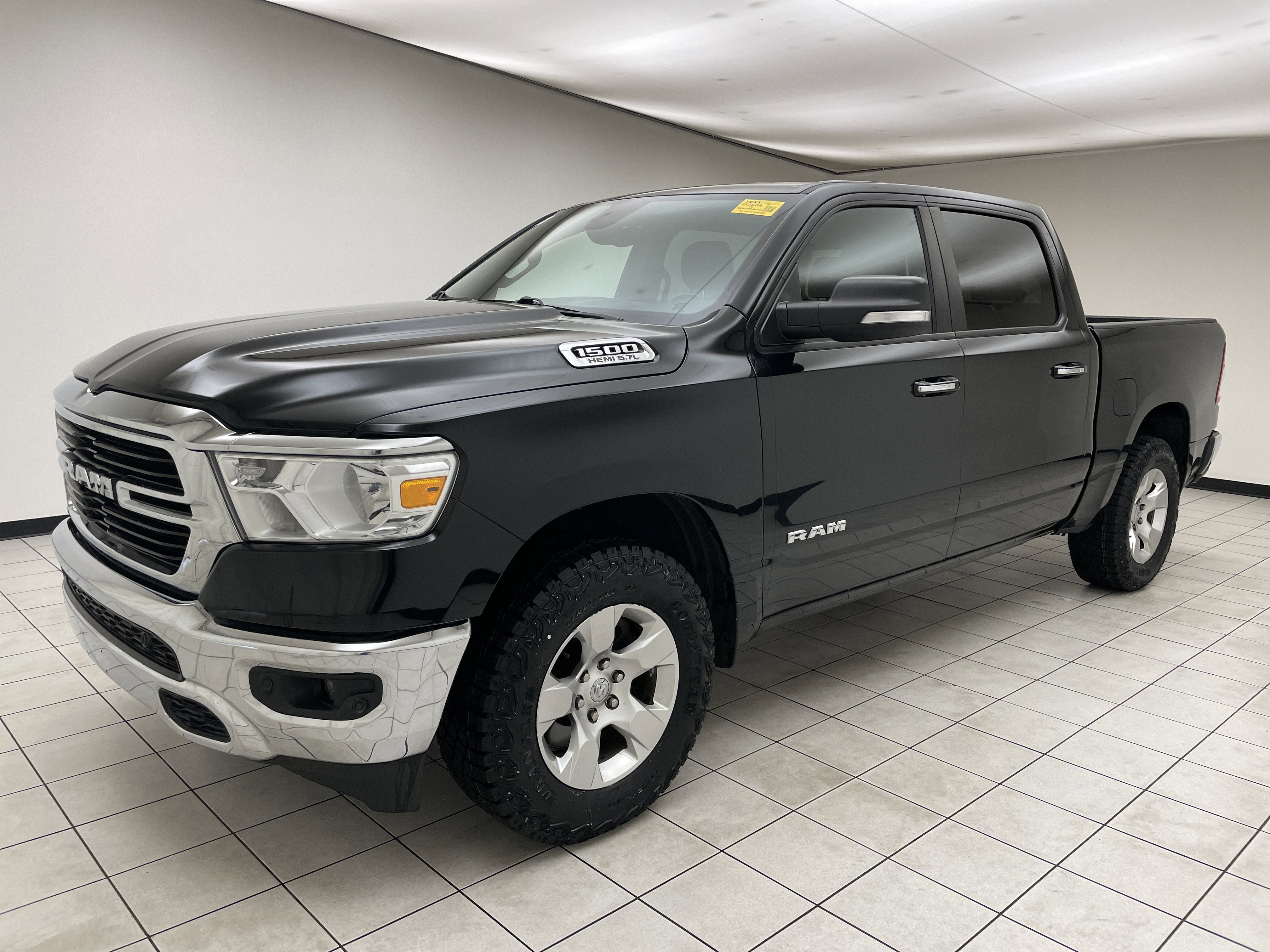 2019 RAM 1500 Big Horn/Lone Star Crew Cab 4x4 5'7' Box in Black Forest Green Pearlcoat — front three-quarter view