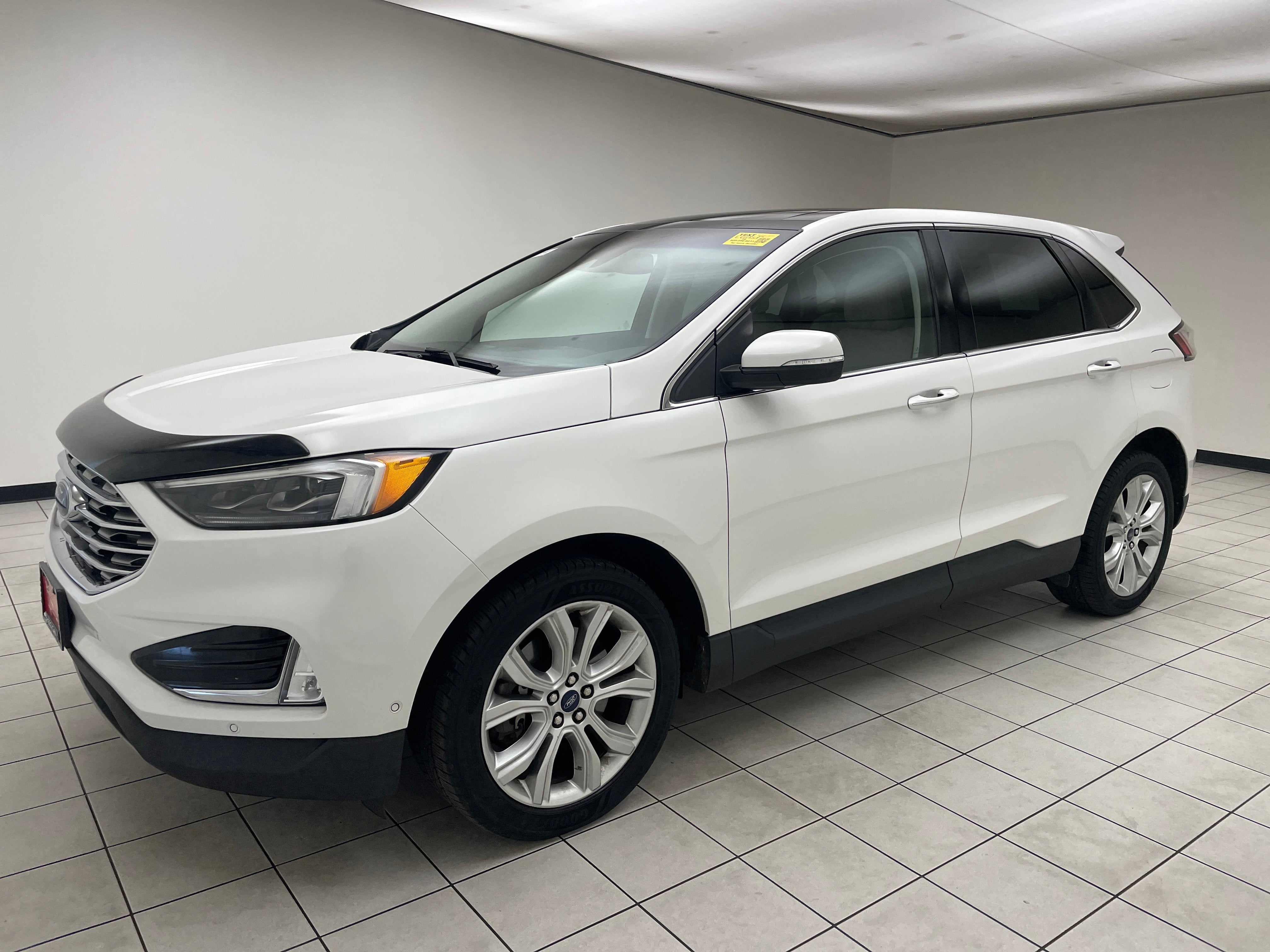 2020 Ford Edge Titanium in White Metallic — front three-quarter view
